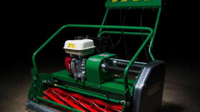 Dennis cylinder mower with red reel blades, the tool Kisasa FC needs to keep the home pitch cut to league standard