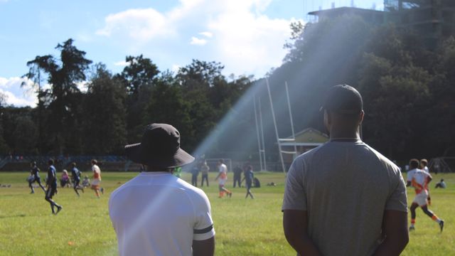 Scout watching a youth football session, looking for the next promising player
