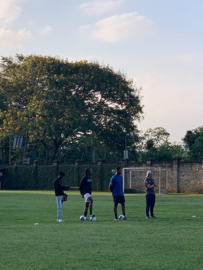 Kisasa FC coaches speaking with young players during the club trials that began the 2026 season.